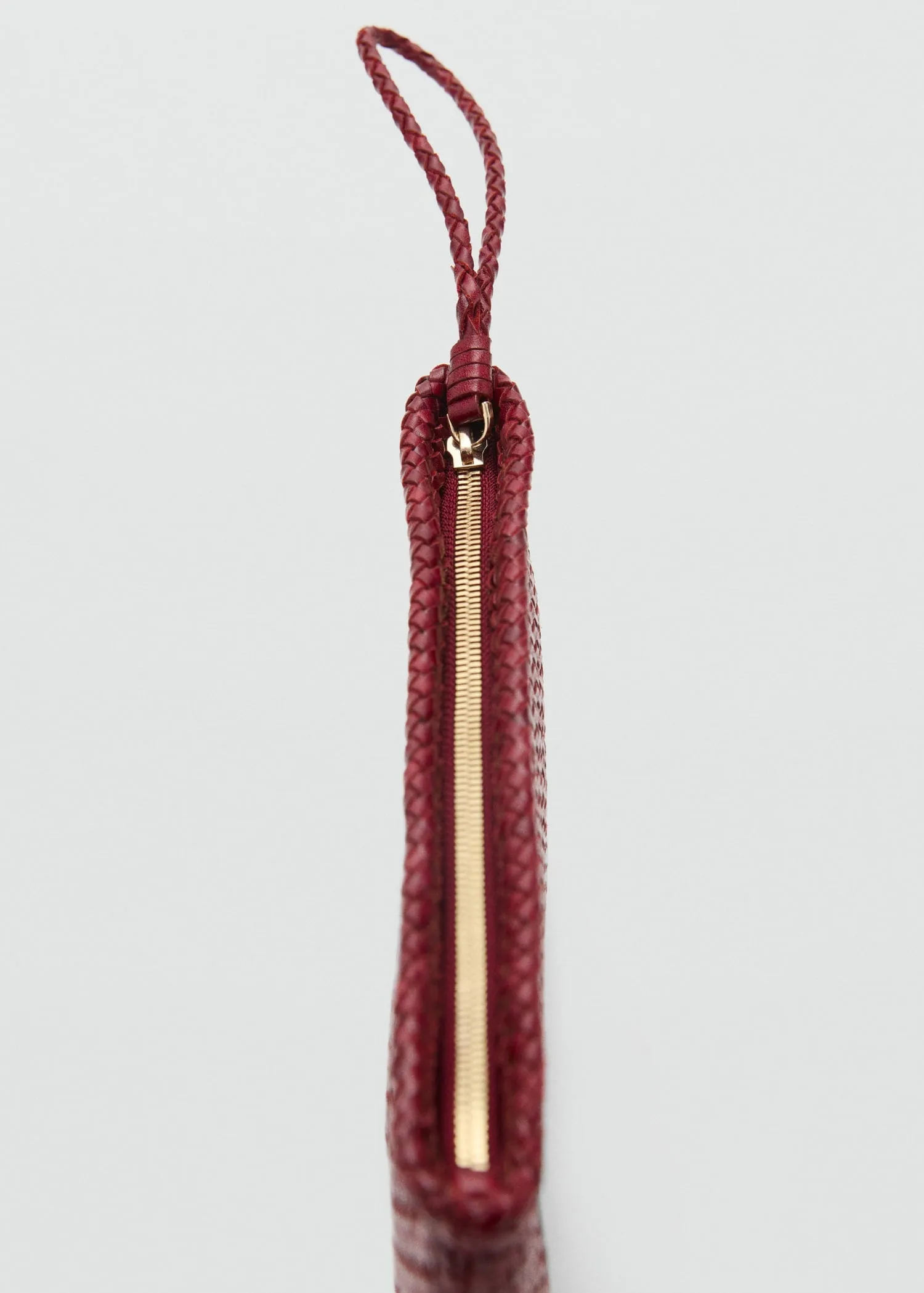 Braided leather clutch