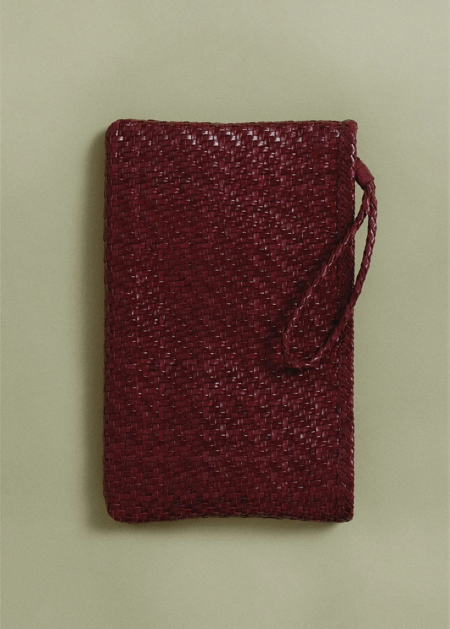 Braided leather clutch