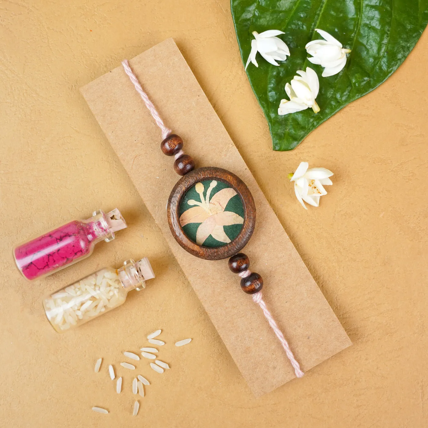 Handmade Eco-friendly Lily Pressed Flower Rakhi with Roli Chawal